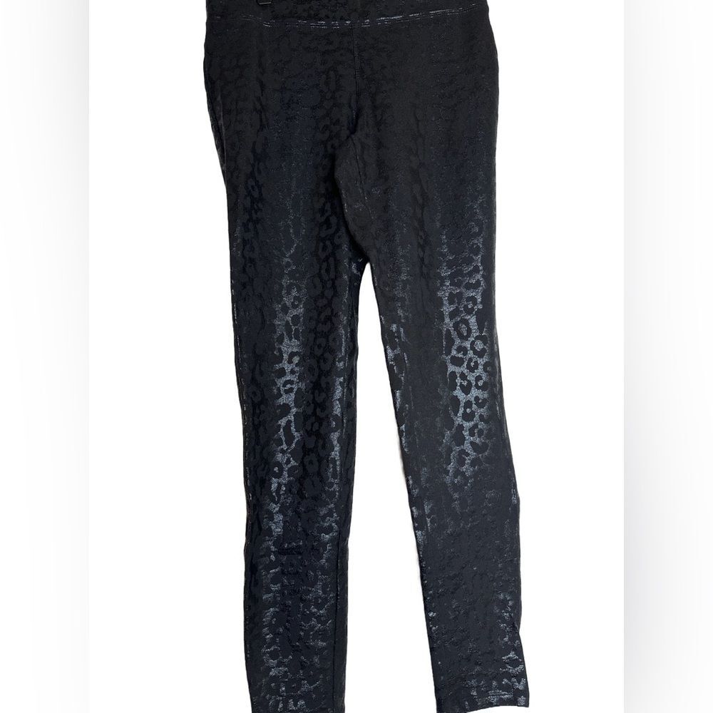 Express black leopard print leggings with slight metallic shimmer. Sz Small